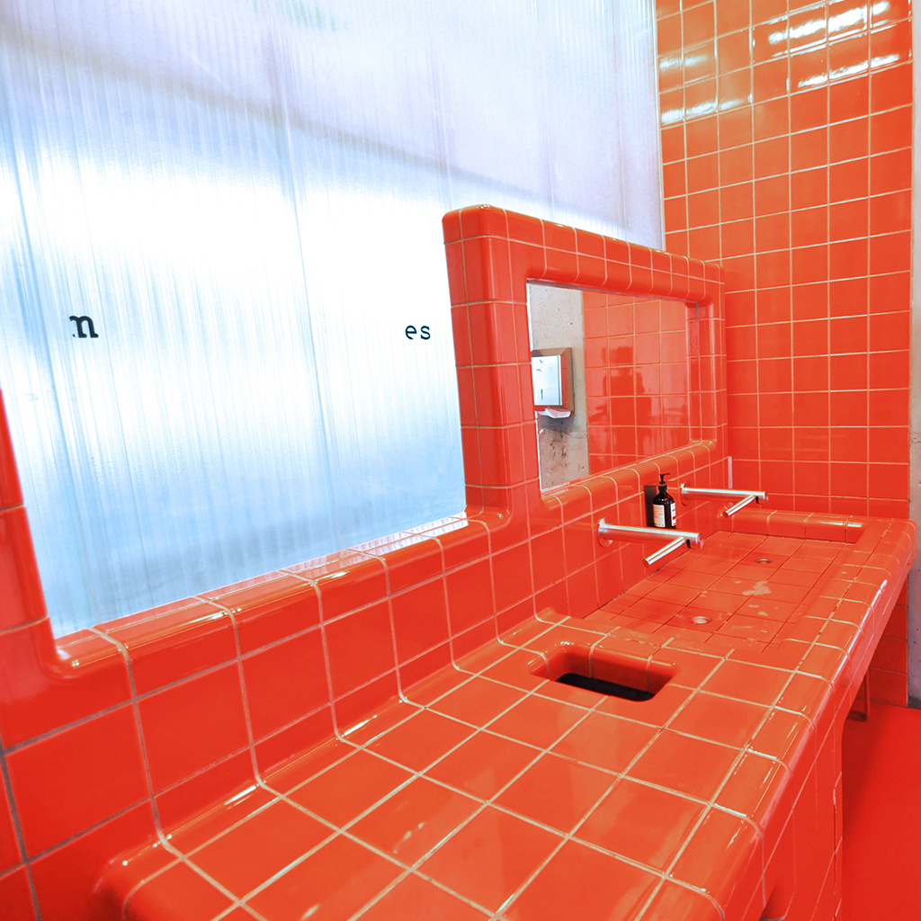 designing bathroom with 3d tiles, integrated tap, sink and mirror